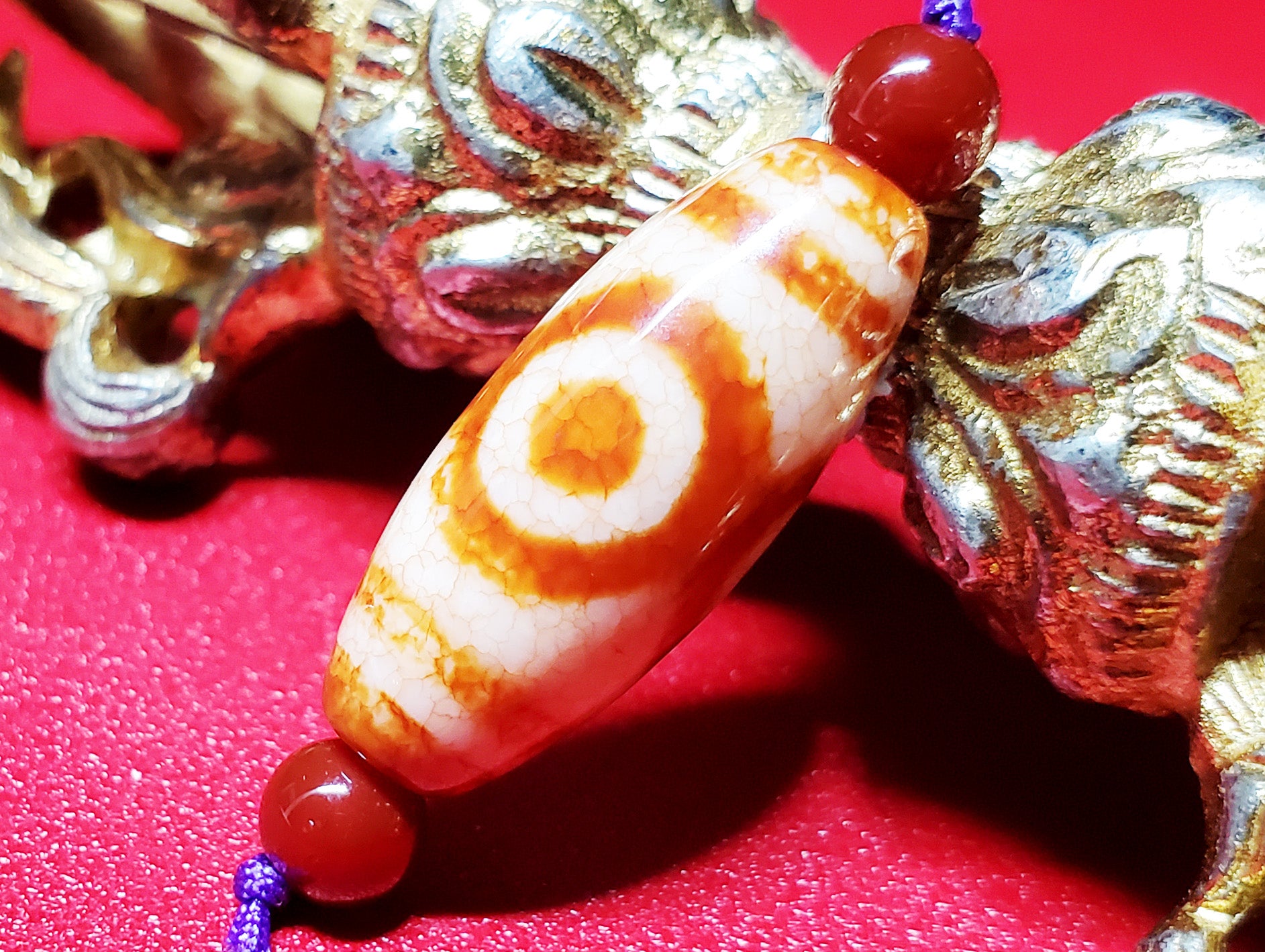 めちゃくちゃ綺麗！オレンジ九眼天珠！ズドドーンとくる！ 上肯天珠・虎牙三眼天珠 – 天然石の店 ふうちゃん